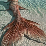Mermaid tails and monofins for swimming, freediving, and performances.