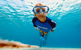 Freediving gear for kids, including wetsuits, masks, snorkels, and fins.
